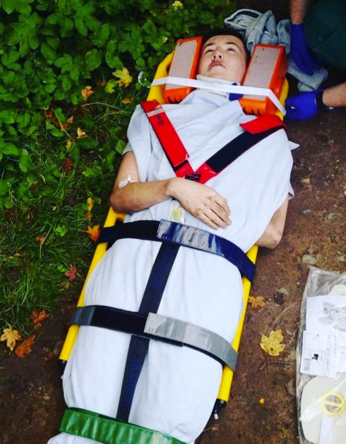 Where it started — Joe on a stretcher after the accident that changed everything