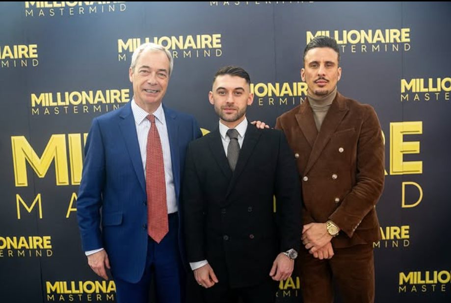 Tom pictured with Nigel Farage at a business event